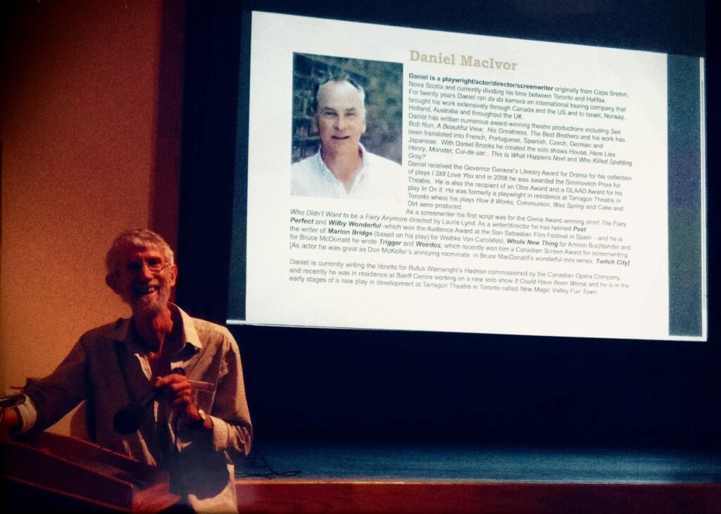 Bruce doing a phone Q&A with Canadian filmmaker, actor Daniel MacIvor, a MM favourite. The film here was “Weirdos” but several other of MacIvor’s films have been featured at MM. Typically with phone-in guests we put a bio up on the screen and use a convenor device so audience can converse directly.