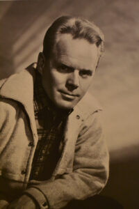 vintage 1950s head and shoulders photo of middle-age male with blond hair