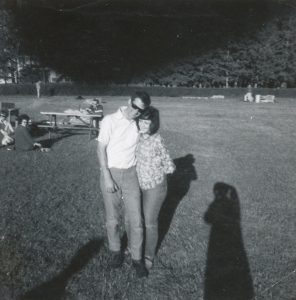 young man and woman in park