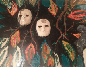 coloured photo of mixed media art piece with white masked faces and leaf motif