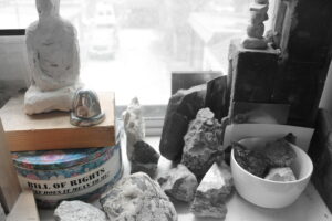 photo of assorted rocks and objects on window sill